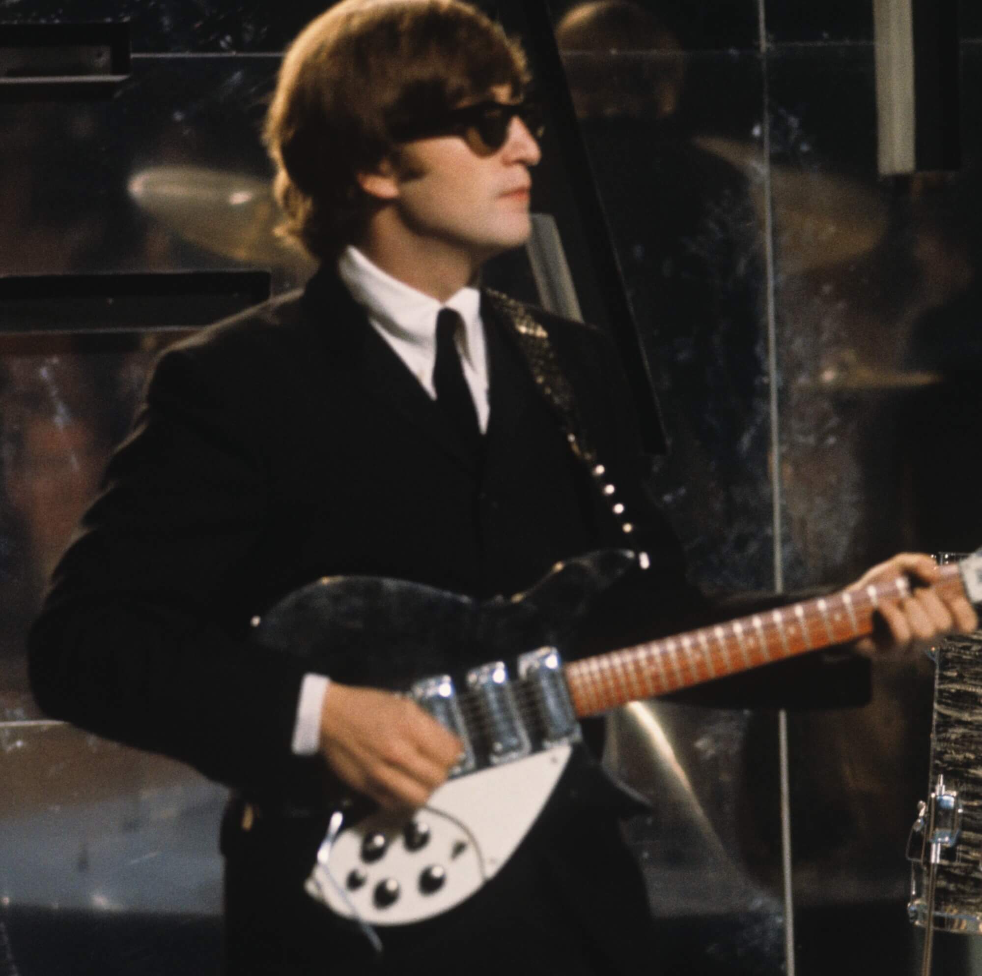John Lennon wearing glasses