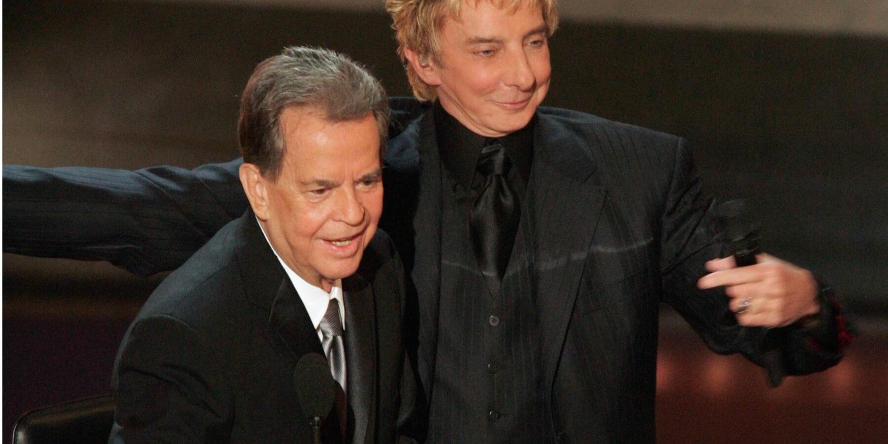 Dick Clark and Barry Manilow pose during The 58th Annual Primetime Emmy Awards at the Shrine Auditorium.