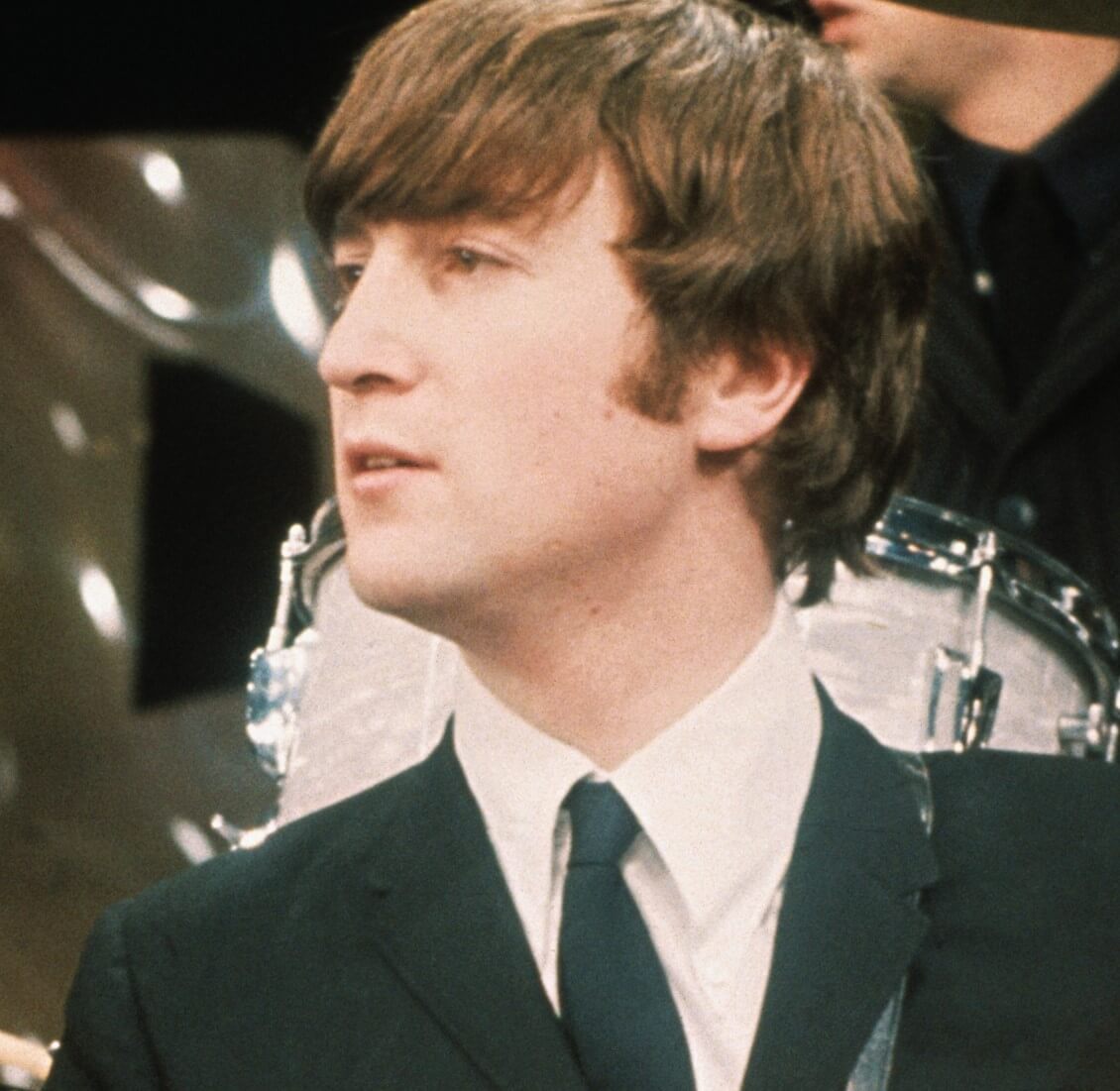 John Lennon in a suit