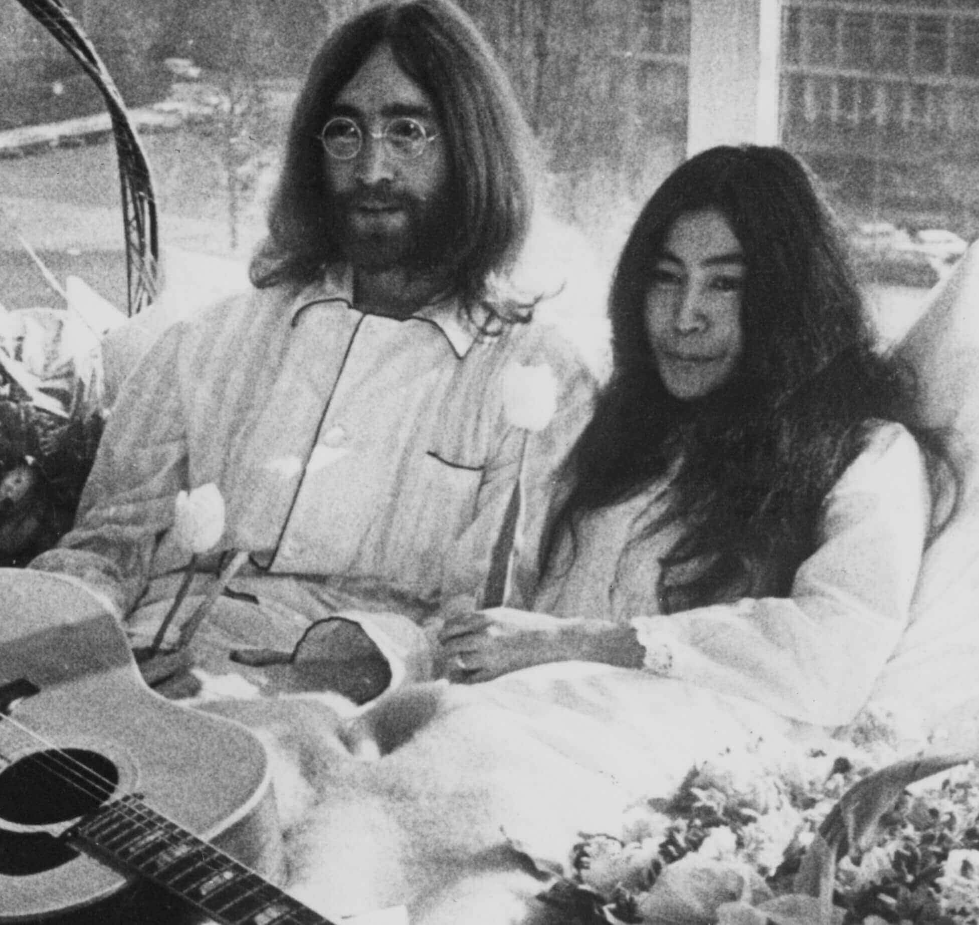 John Lennon and Yoko Ono in bed