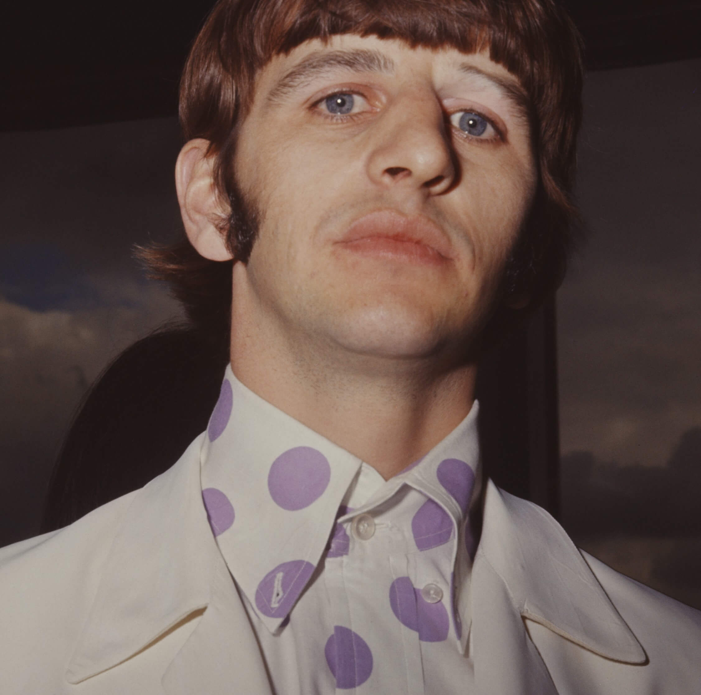 The Beatles' Ringo Starr in a white suit