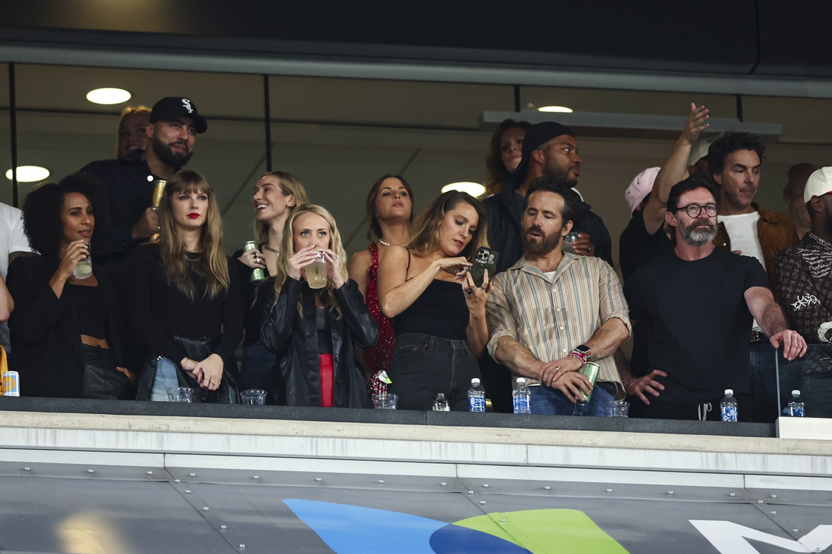 Taylor Swift, Brittany Mahomes, Blake Lively, Ryan Reynolds, and Hugh Jackman watch from the stands during an NFL football game between the New York Jets and the Kansas City Chiefs at MetLife Stadium on October 1, 2023