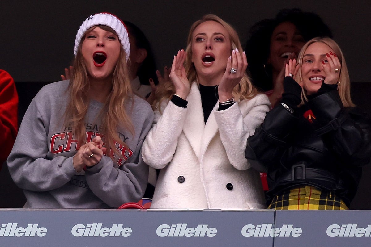 Taylor Swift, Brittany Mahomes, and Ashley Avignone cheer after a Kansas City Chiefs touchdown during the second quarter against the New England Patriots at Gillette Stadium on December 17, 2023
