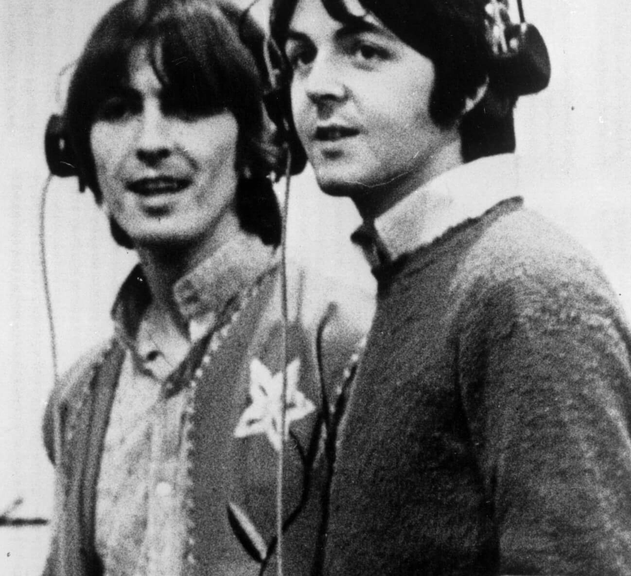 The Beatles' George Harrison and Paul McCartney in black-and-white