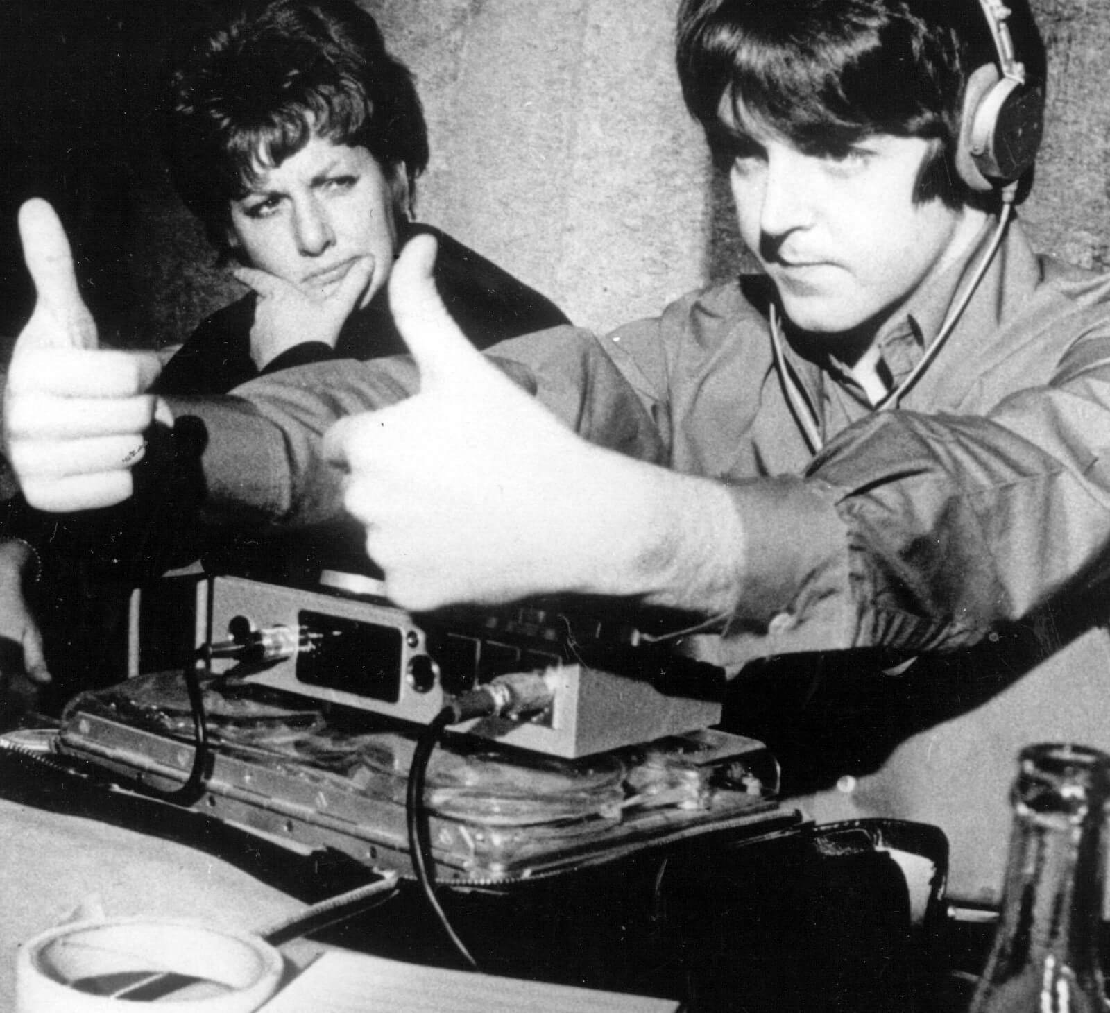 The Beatles' Paul McCartney with his thumbs up