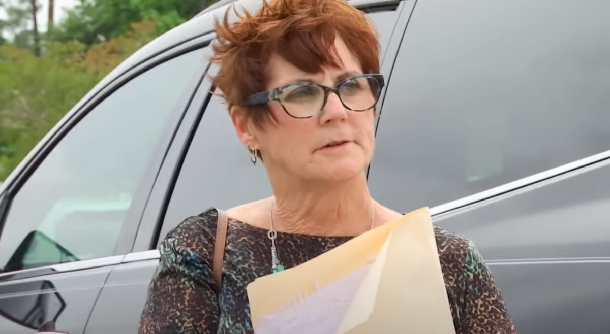 Barbara Evans stands outside the courthouse on an episode of 'Teen Mom 2' 