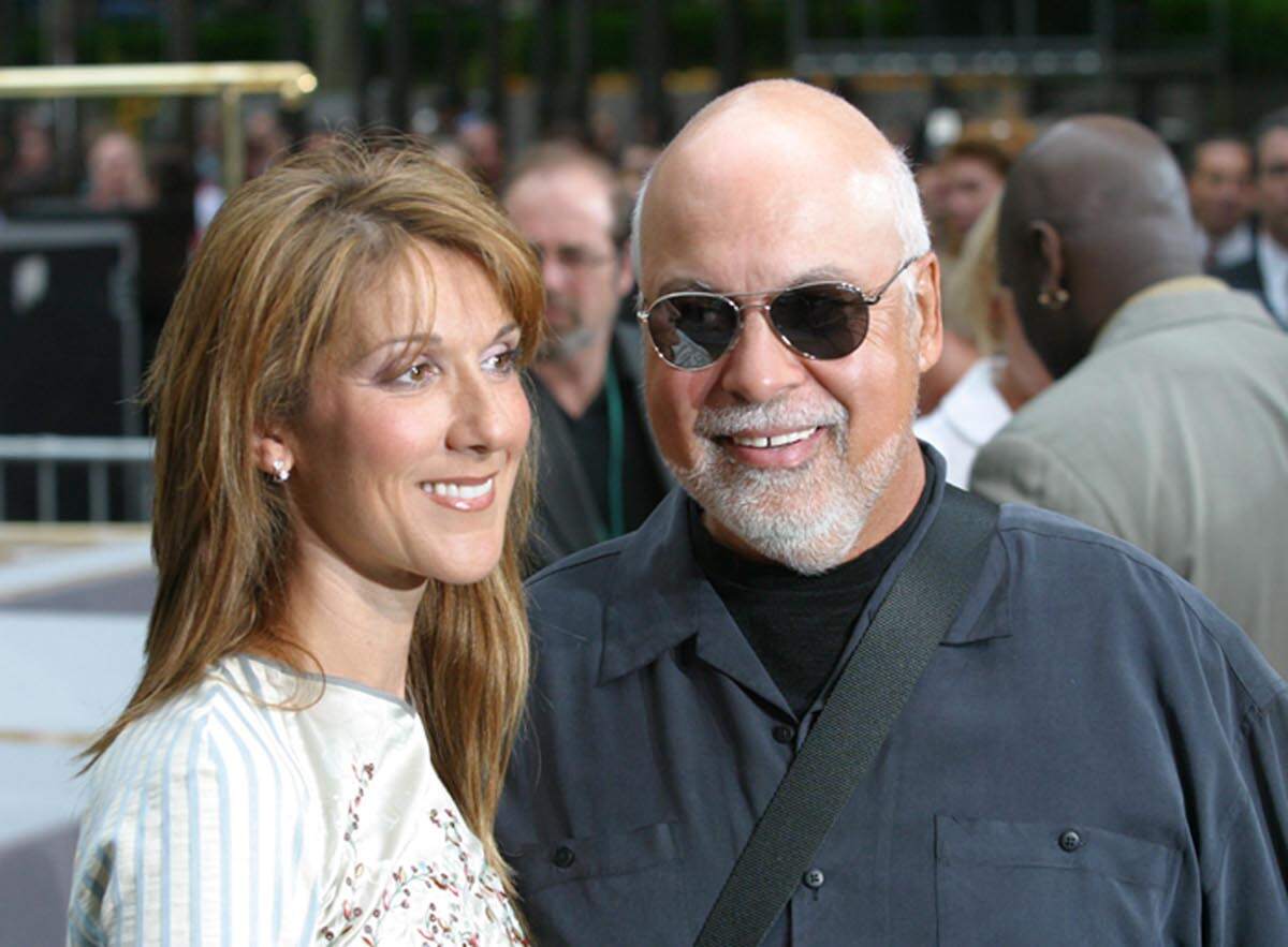 Singer Celine Dion and husband Rene Angelil smile together during Celine Dion Performs on The Today Show in 2002