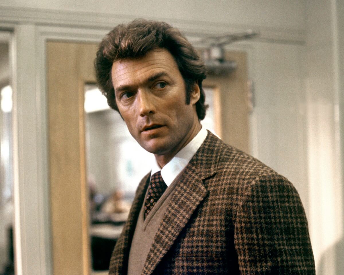 Clint Eastwood posing in character as Dirty Harry.