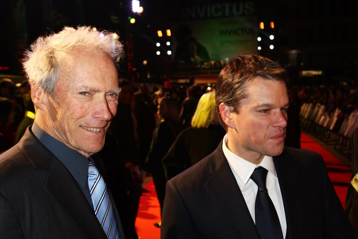 Clint Eastwood and Matt Damon attend the UK premiere of 'Invictus' in suits.