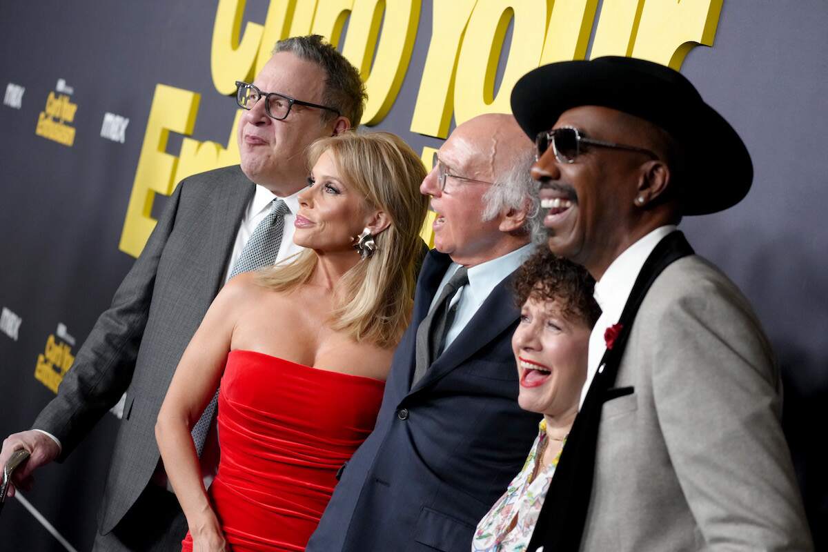 Jeff Garlin, Cheryl Hines, Larry David, Susie Essman, and J.B. Smoove gather together and smile for cameras on the red carpet of the Curb Your Enthusiasm Season 12 premiere