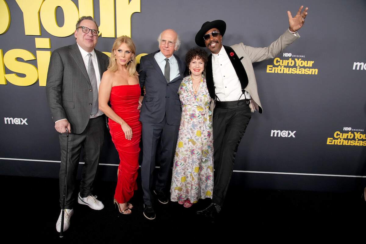 Jeff Garlin, Cheryl Hines, Larry David, Susie Essman, and J.B. Smoove gather together and smile for cameras on the red carpet of the Curb Your Enthusiasm Season 12 premiere