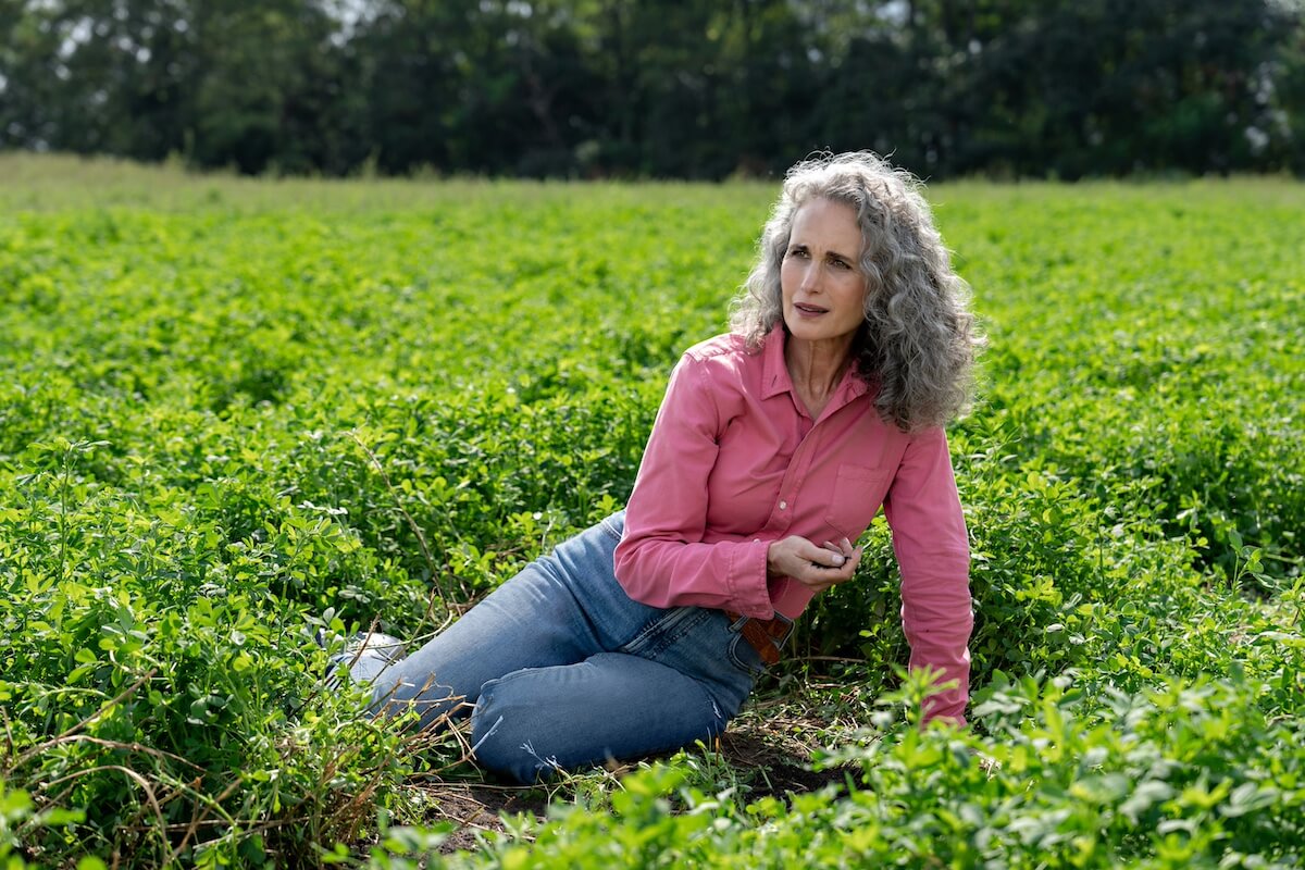 Del lounging in a field in 'The Way Home' Season 2