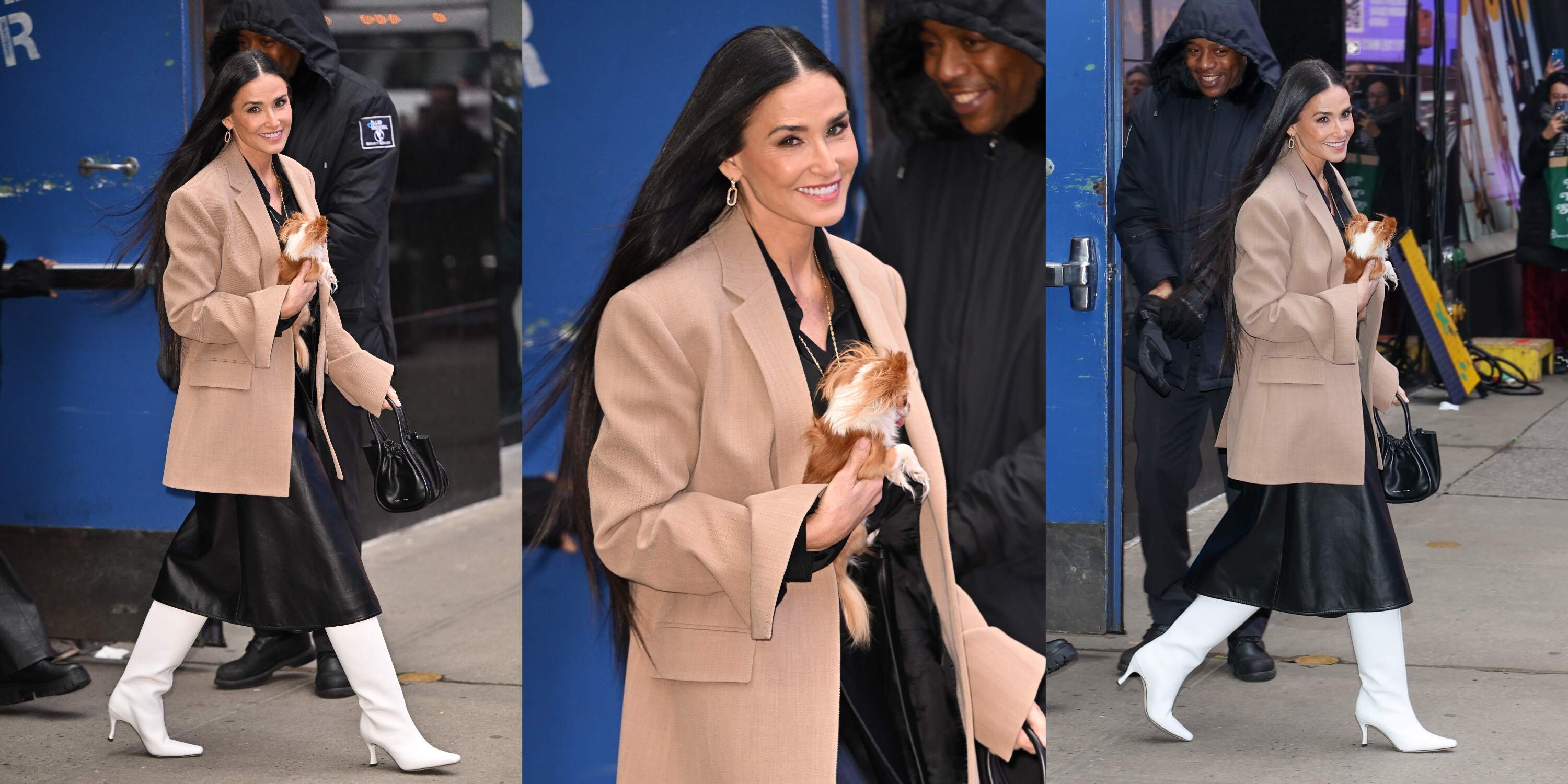 Actor Demi Moore walks with her chihuahua across a street in NYC while wearing a tan blazer and white boots