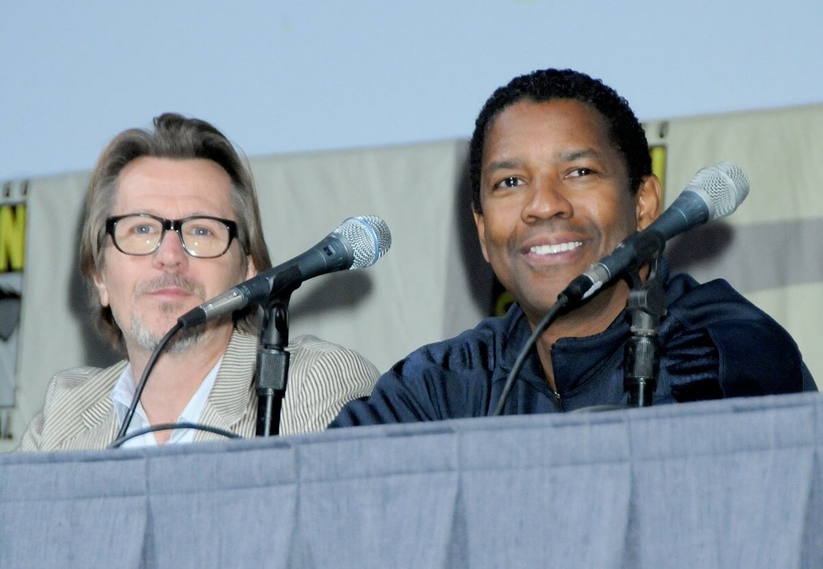 Denzel Washington sitting next to Gary Oldman at Comic-Con International: San Diego 2009.