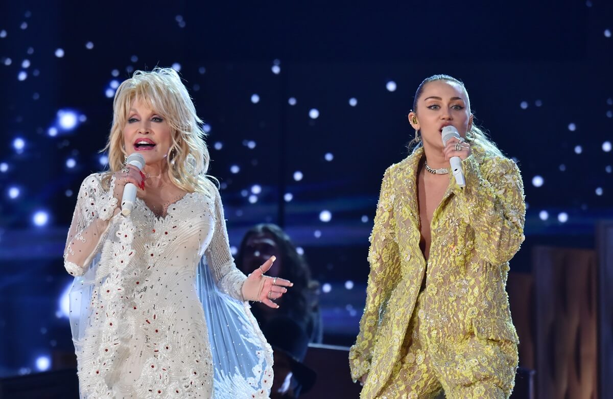 Dolly Parton and Miley Cyrus Miley Cyrus perform onstage during the 61st Annual GRAMMY Awards.