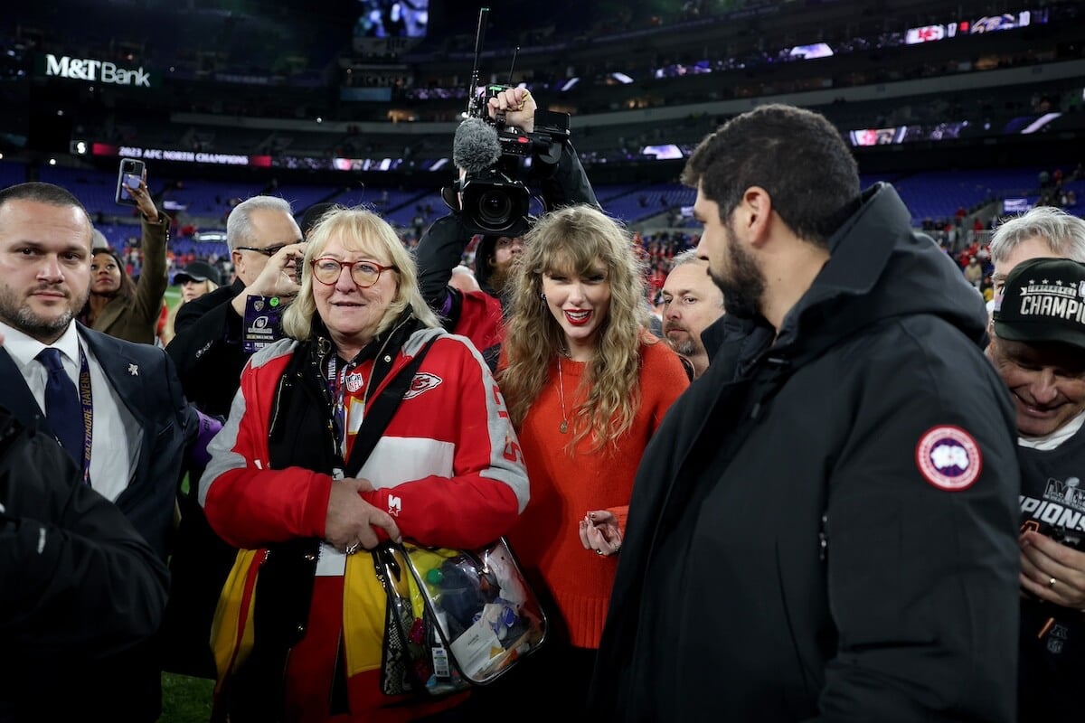 Donna Kelce standing next to Taylor Swift on M&T Bank Stadium field