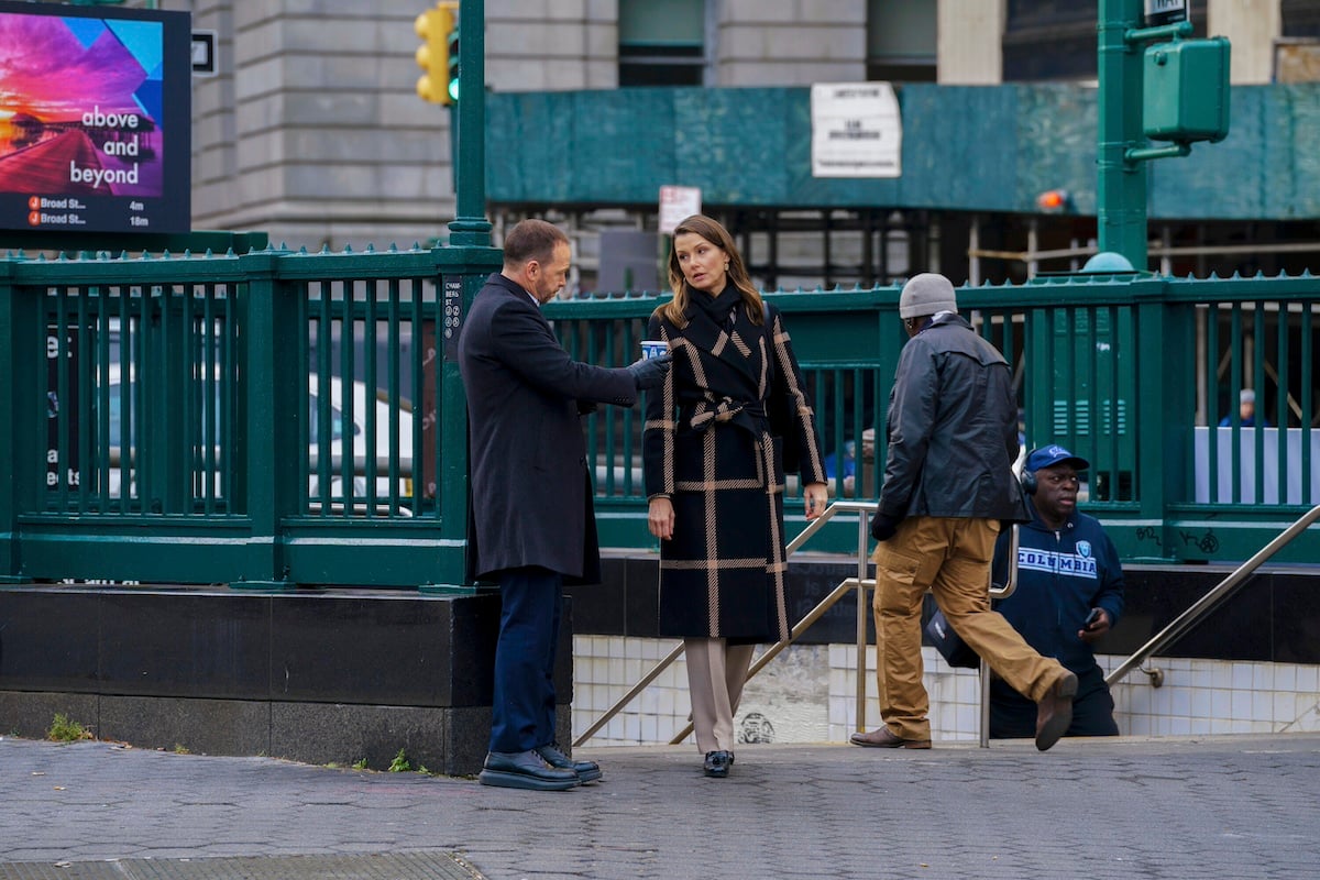 Danny Reagan and Erin Reagan standing outside a subway entrance in 'Blue Bloods' Season 14