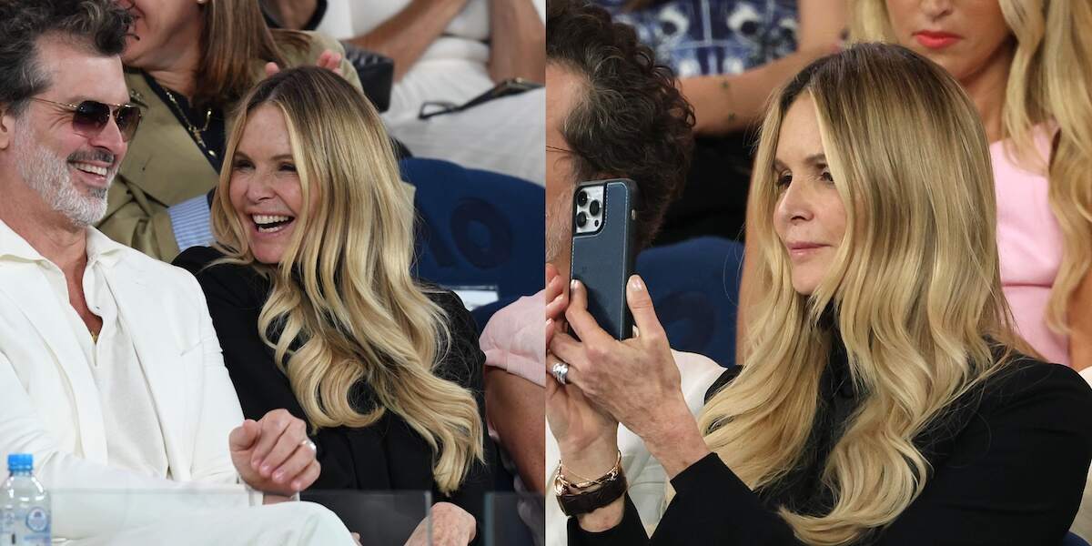 Elle Macpherson records on her cell phone as she watches the 2024 Australian Open from the stands
