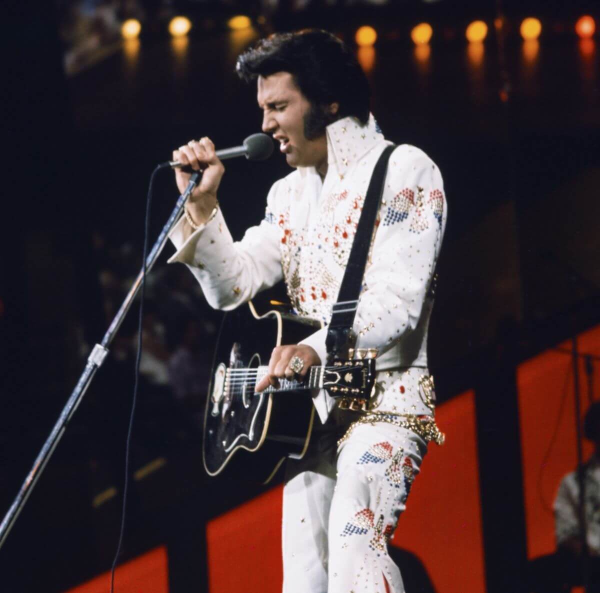 Elvis Presley in a white suit