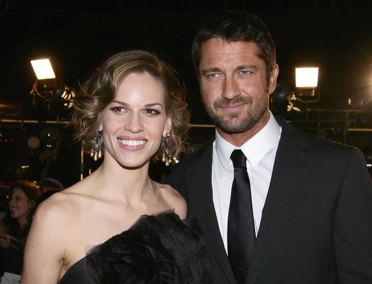 Gerard Butler and Hilary Swank posing at the premiere of Warner Bros.' "P.S. I Love You" held at Grauman's Chinese Theater.