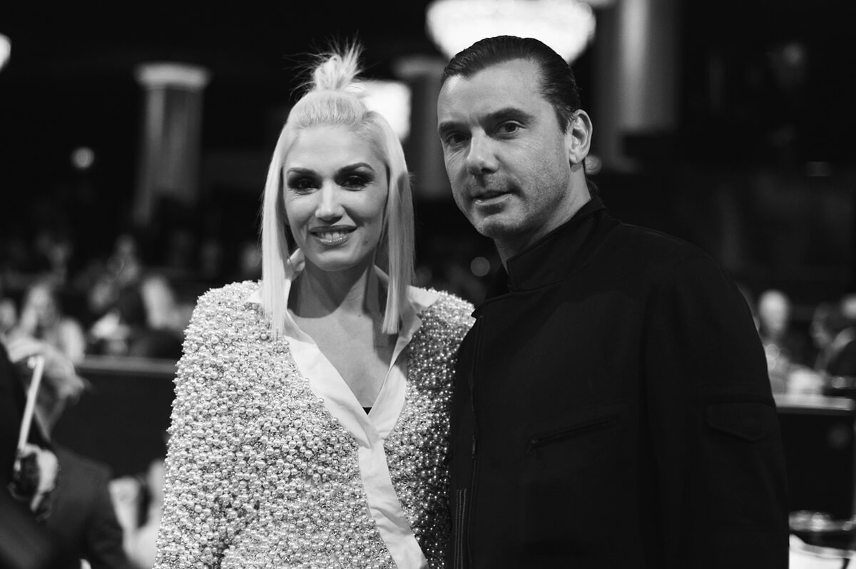 Gwen Stefani and Gavin Rossdale attend the PEOPLE Magazine Awards in a dress and a suit.