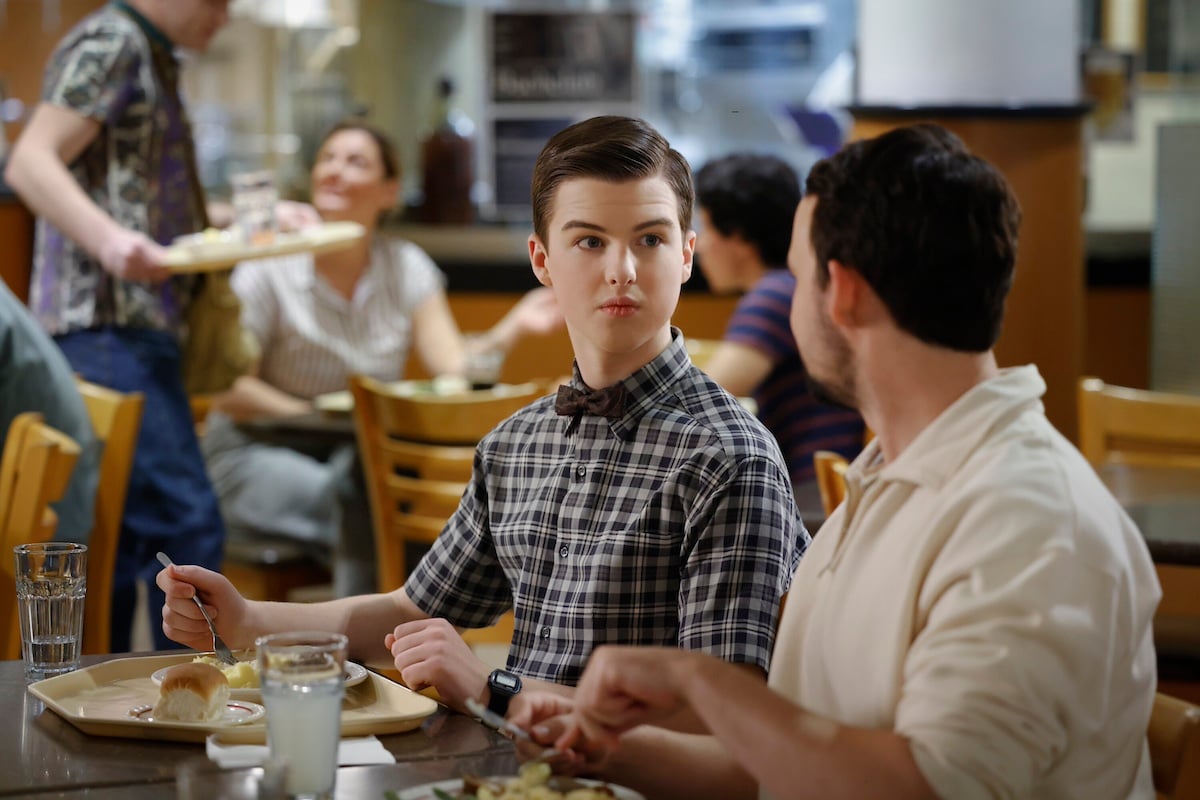 Iain Armitage, wearing a checked shirt, in 'Young Sheldon'