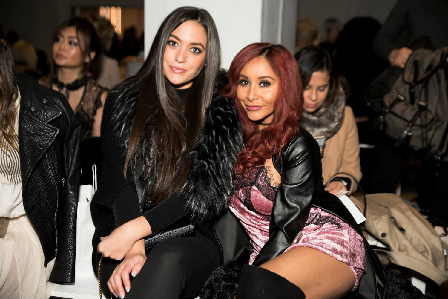 'Jersey Shore: Family Vacation' Season 7 stars Sammi Giancola and Nicole "Snooki" Polizzi sitting next to each other at New York Fashion Week in 2017