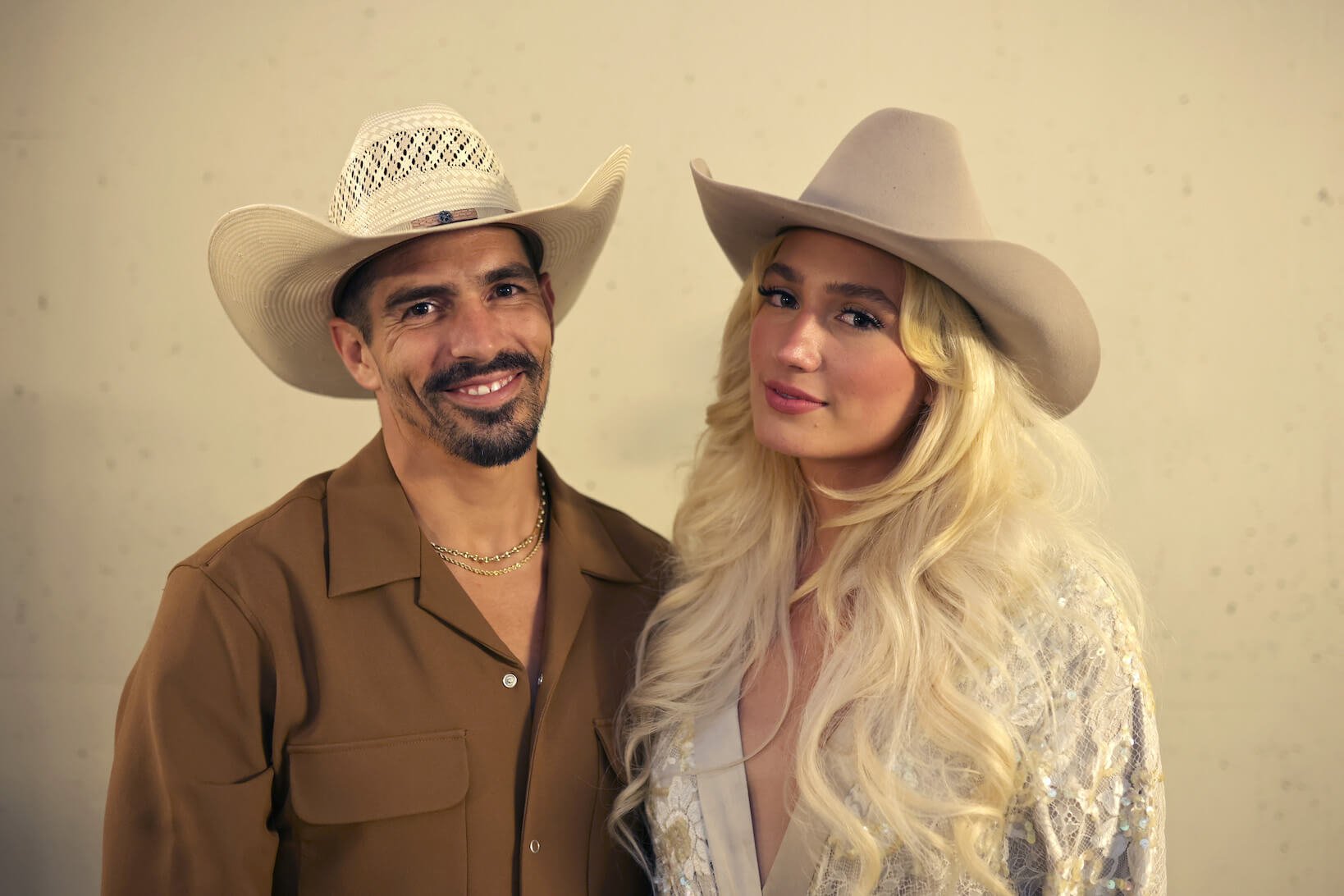 'The Challenge' star Jordan Wiseley next to his girlfriend, Diner. They're both wearing cowboy hats.