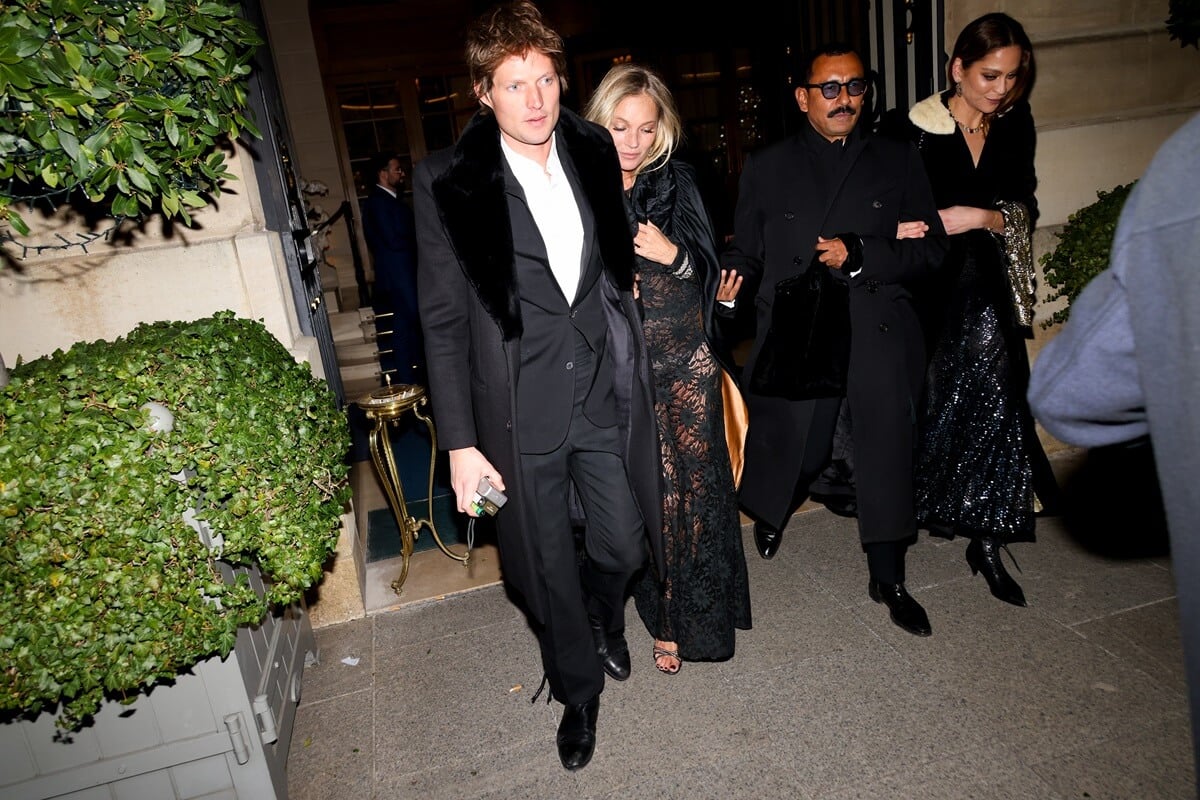 Kate Moss walking with her younger boyfriend Nikolai von Bismarck out of the Ritz.