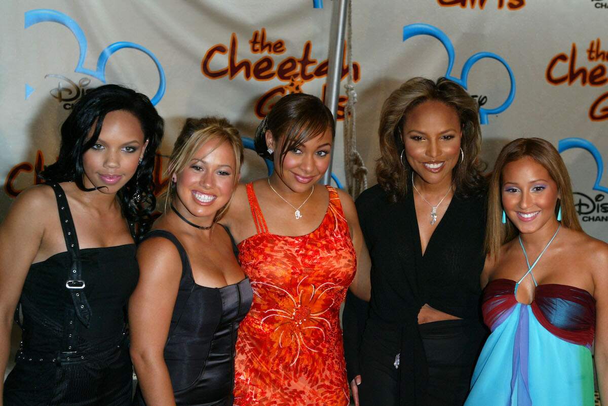 Kiely Williams, Sabrina Bryan, Raven-Symoné, Lynn Whitfield and Adrienne Bailon smile on the red carpet at the premiere of Disney Channel's The Cheetah Girls