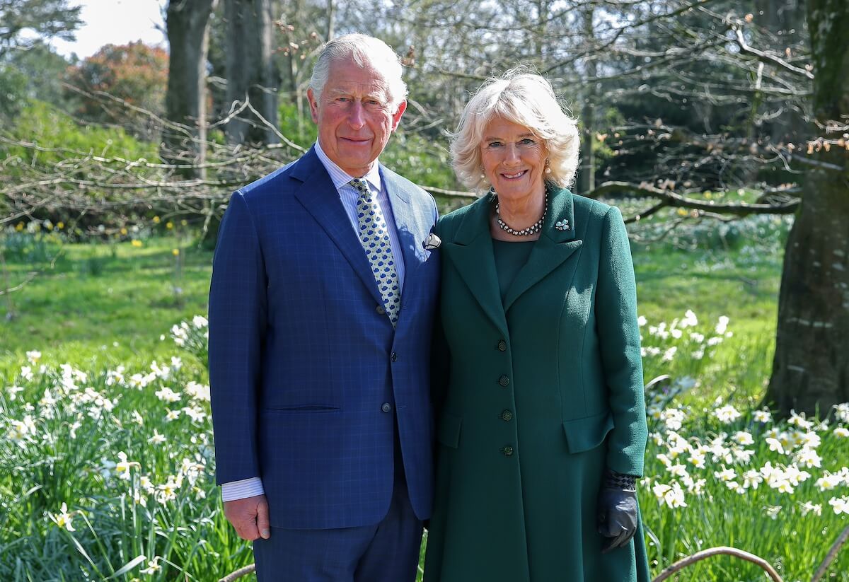 King Charles and Camilla Parker Bowles pose side-by-side.