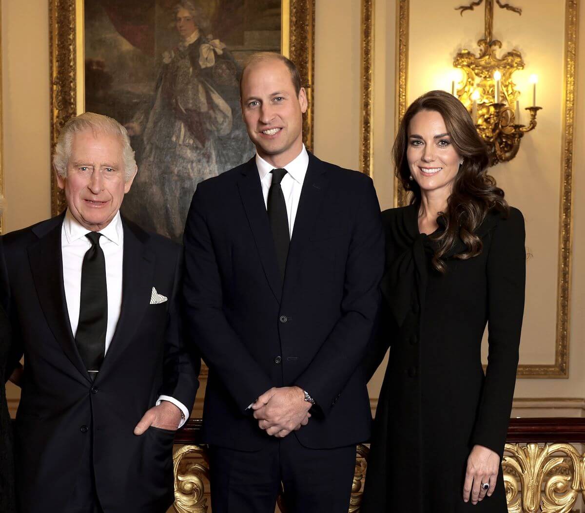 King Charles III, Prince William, and Kate Middleton pose for a photo ahead of reception for Heads of State and Official Overseas Guests at Buckingham Palace