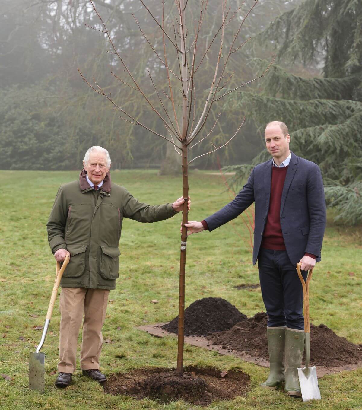 King Charles III and Prince William plant a tree to mark the end of The Queen's Green Canopy initiative in the gardens of Sandringham House