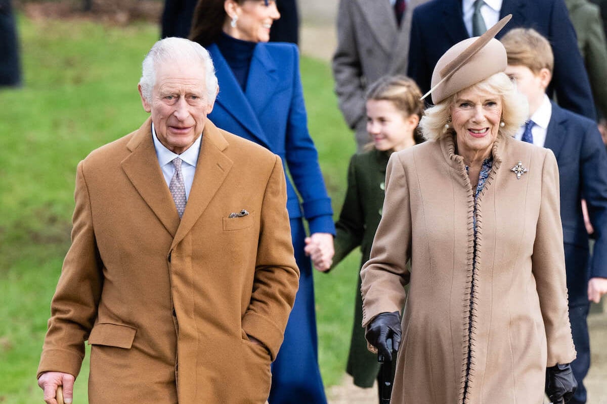 King Charles, who does 'Harry Potter' voices 'brilliantly' with the grandchildren, according to Queen Camilla, walks with Queen Camilla