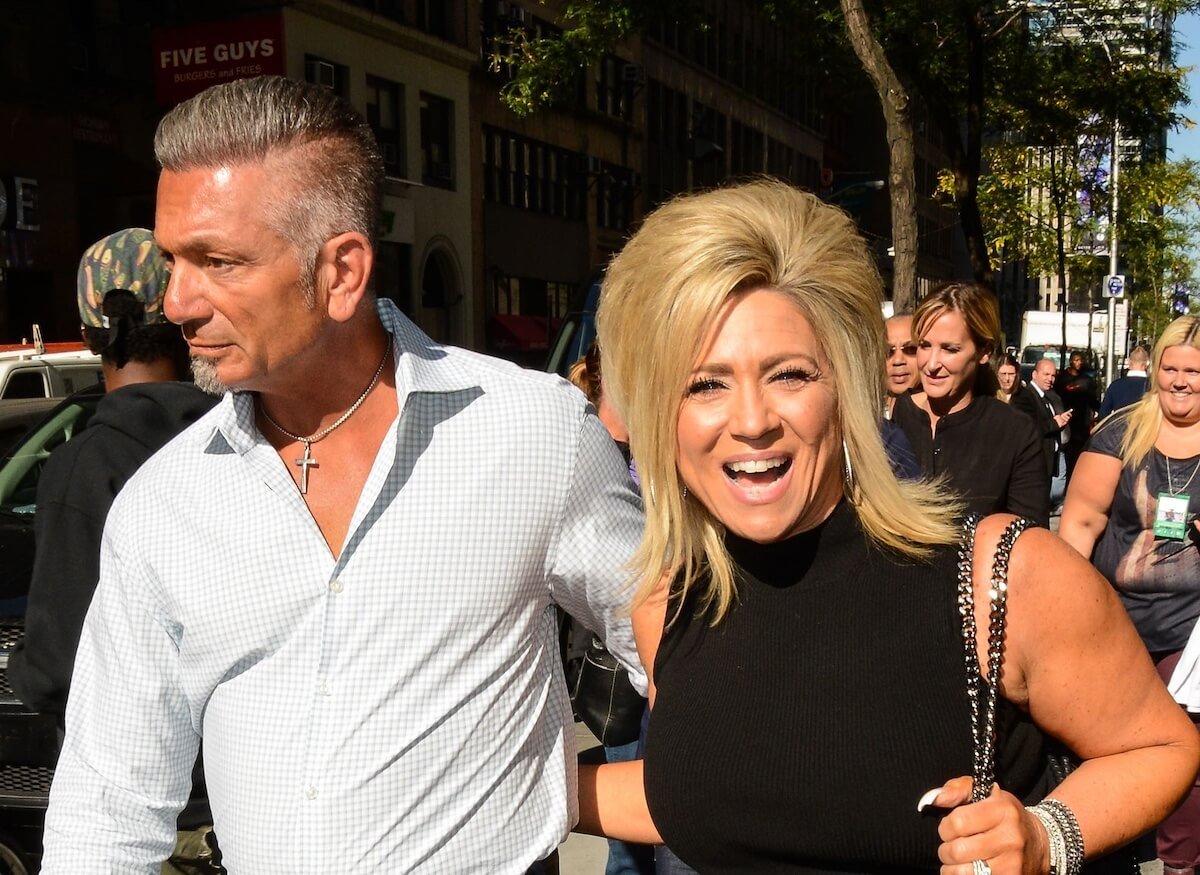 Larry Caputo and Theresa Caputo walking on the street in NYC