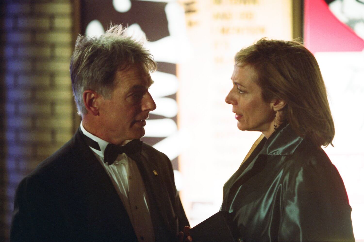 Mark Harmon as Agent Simon Donovan and Allison Janney as Claudia Jean 'C.J.' Cregg act out a scene in 'The West Wing'