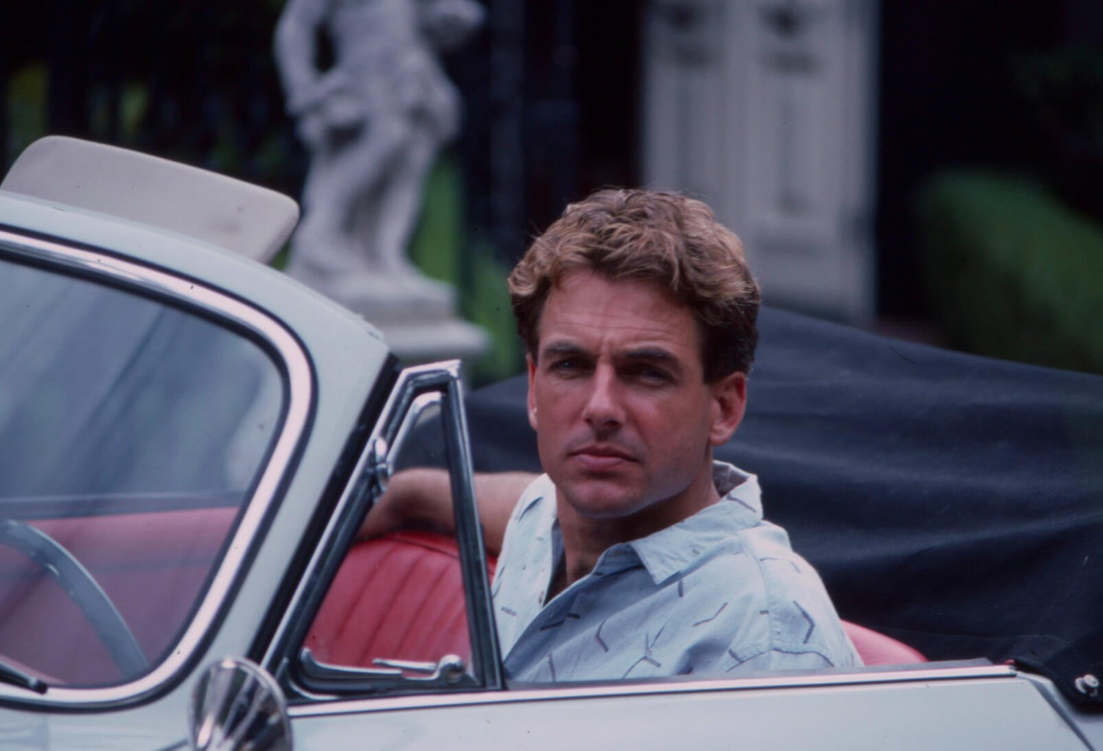 Mark Harmon in a car in 1986 while filming the ABC TV movie 'Prince of Bel Air'