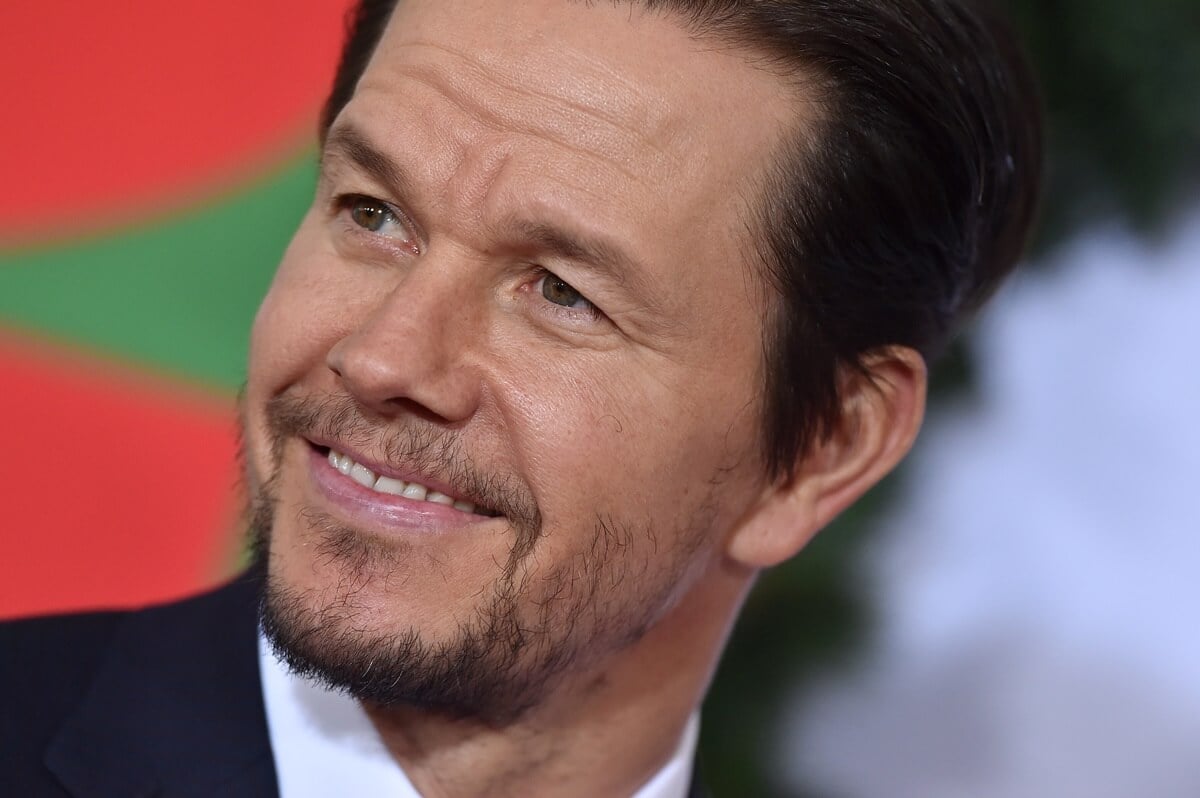 Mark Wahlberg smiling in a suit at the premiere of at the premiere of Paramount Pictures' 'Daddy's Home 2'.