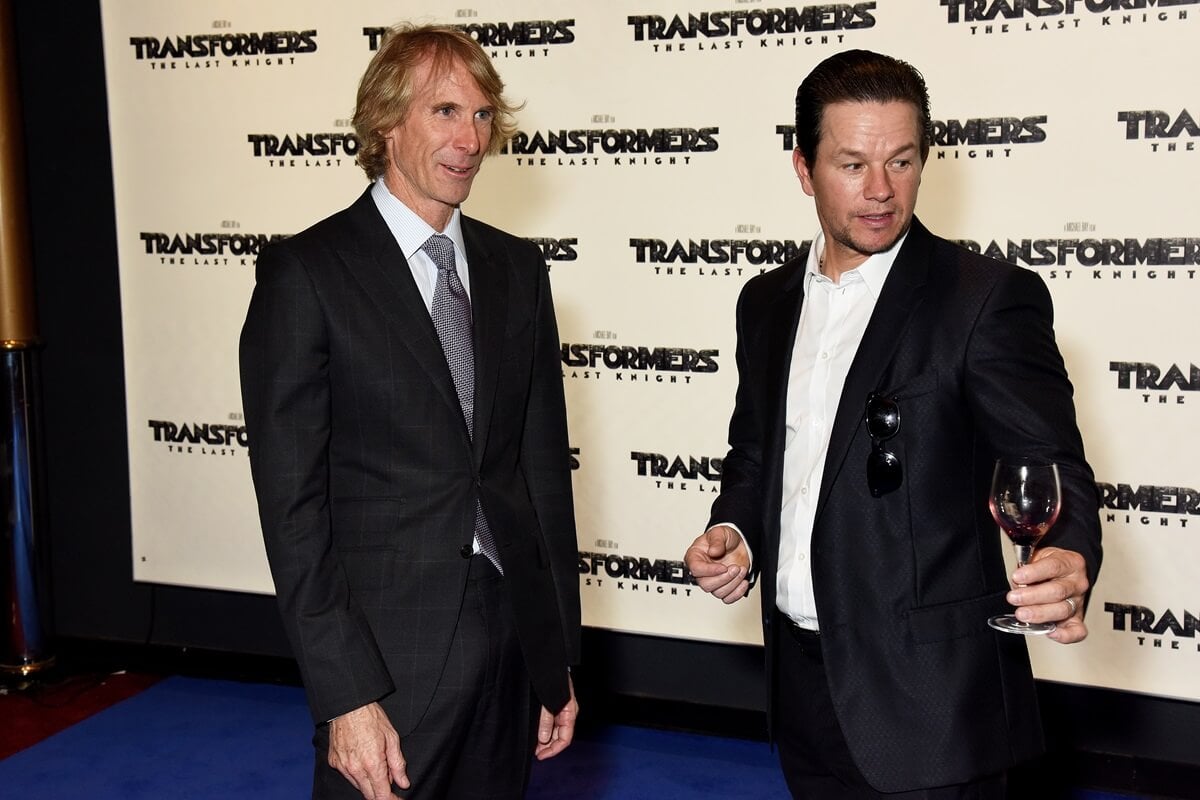 Mark Wahlberg posing alongside Michael Bay at the the global premiere of "Transformers: The Last Knight".