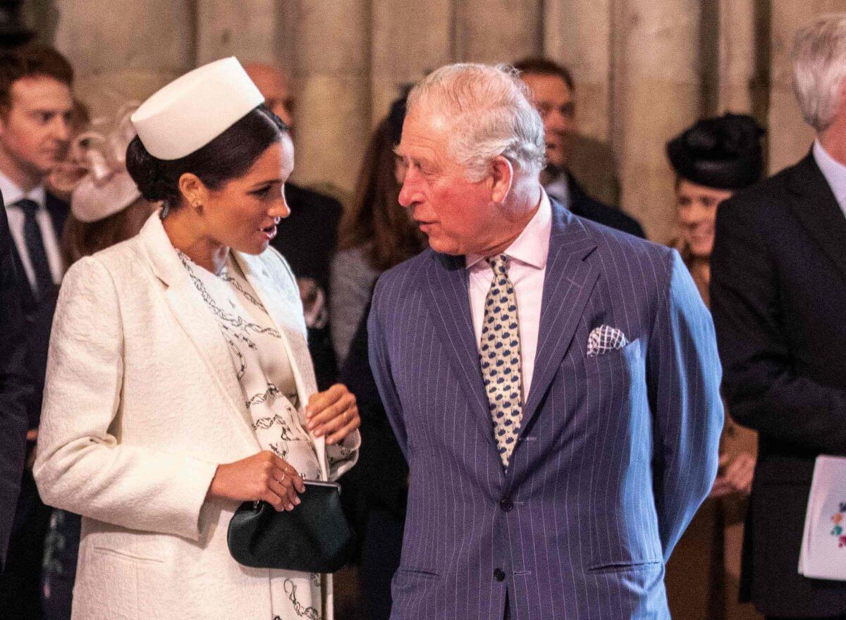 Meghan Markle and now-King Charles III speaking during the 2019 Commonwealth Day service