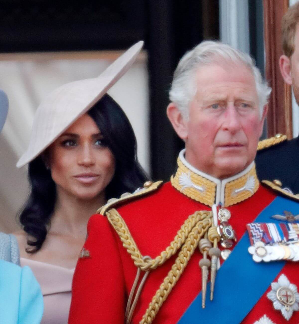 Meghan Markle and now-King Charles III standing on the balcony of Buckingham Palace during Trooping The Colour 2018