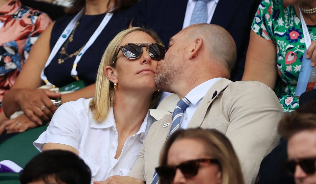 Mike Tindall kisses Zara Tindall on the cheek during day two of The Championships Wimbledon