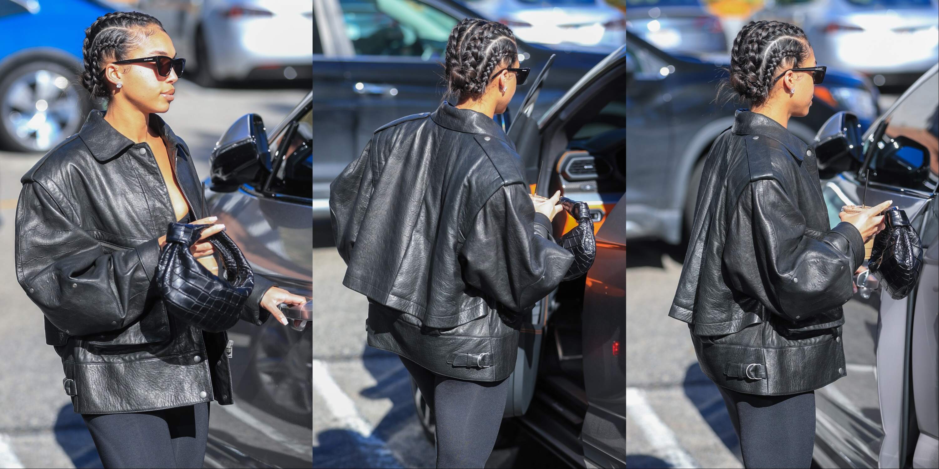Model Lori Harvey picks up an iced coffee on a sunny day in LA while wearing a leather jacket and black leggings