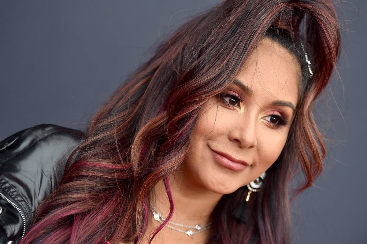 Nicole 'Snooki' Polizzi posing in a black jacket while at the 2019 MTV Video Music Awards at Prudential Center