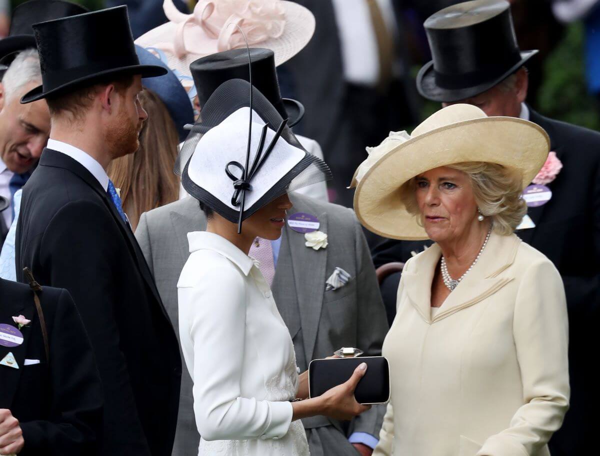 Prince Harry, Meghan Markle, and Camilla Parker Bowles (now Queen Camilla) attend Royal Ascot Day 2018