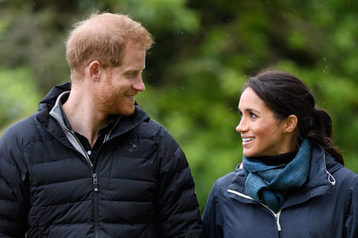 Prince Harry, who thought he 'surely irritated' Meghan Markle on their first date, stands with Meghan Markle