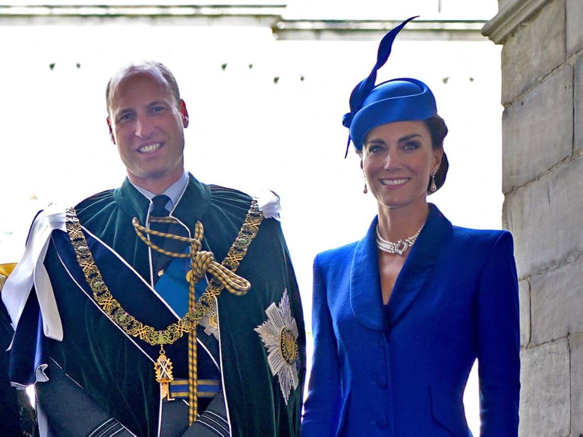 Prince William and Kate Middleton pose for a photo at the Palace of Holyroodhouse in Scotland