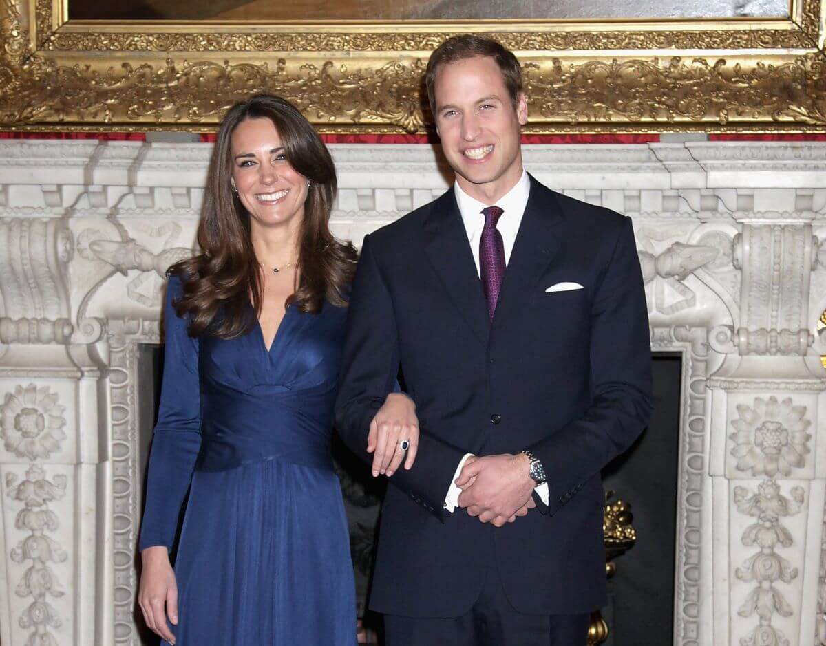 Prince William and Kate Middleton pose for photographs after their engagement was announced