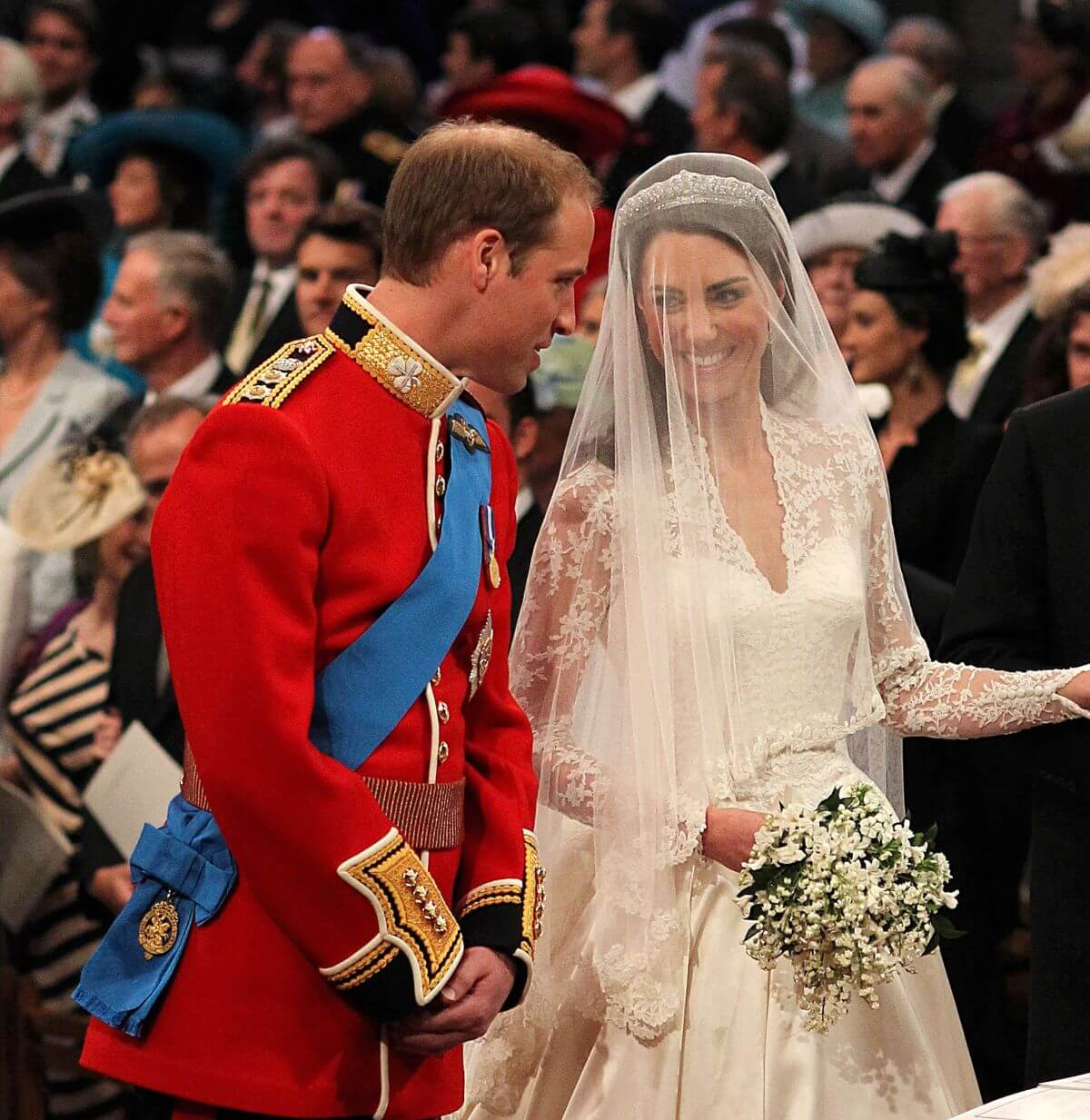 Prince William speaks to his bride Kate Middleton during their wedding ceremony at Westminster Abbey
