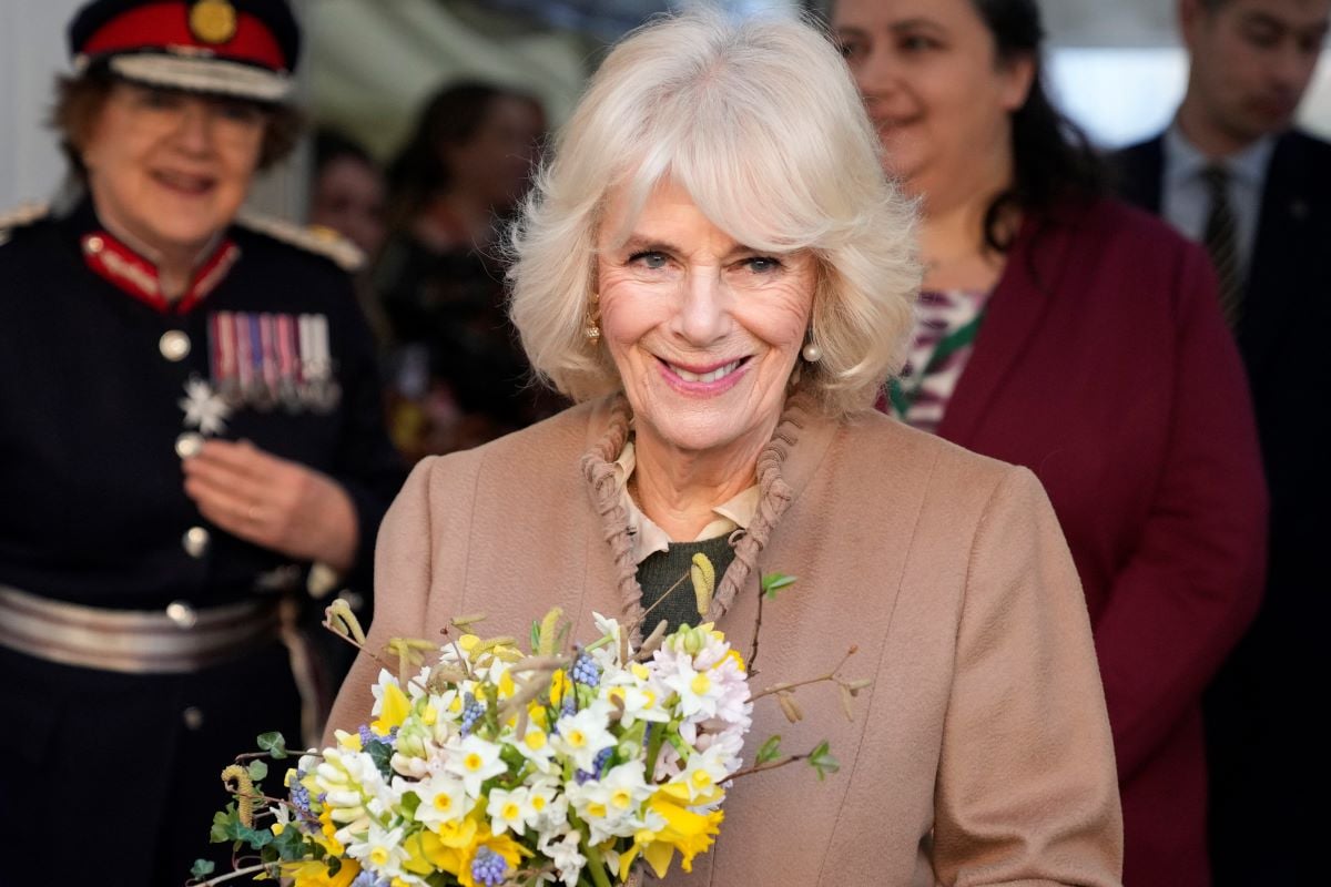 Queen Camilla leaves after a visit to a women's refuge in Swindon, England